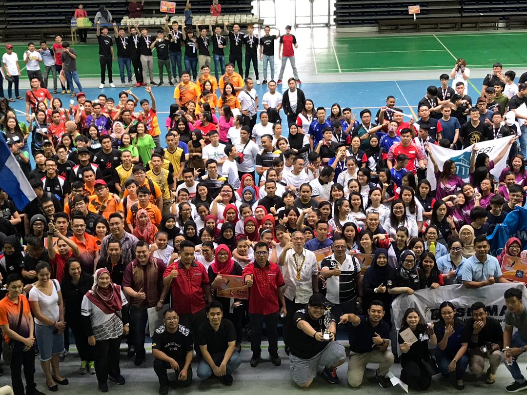 Group photo of athletes and invited guests after the closing ceremony.