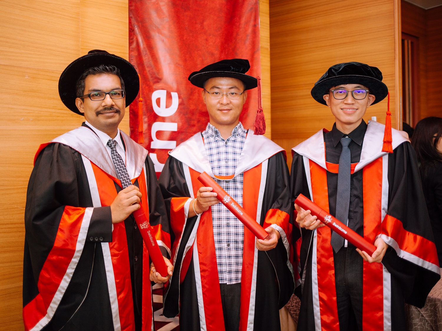 (L-R) PhD graduates Raj Sekar Sethu, Jing Wenlong and Tay Jia Jun.