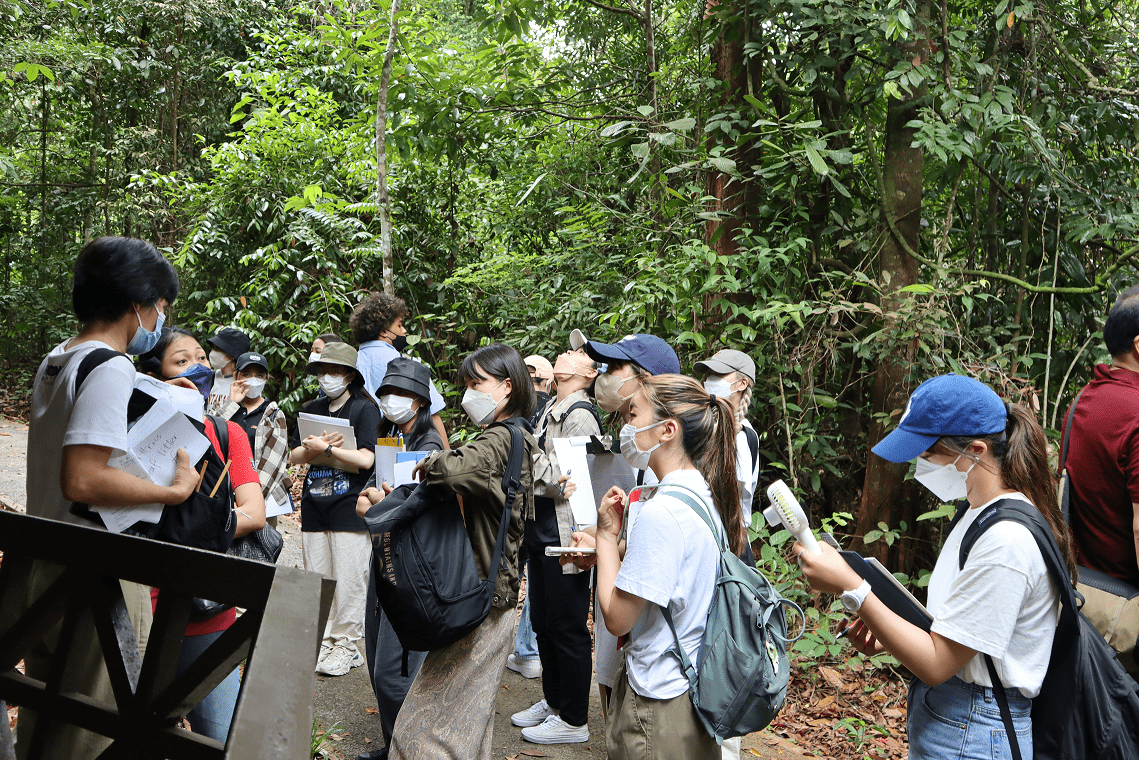 The KUIS students take part in a guided tour of Sama Jaya Nature Reserve, jotting down notes on flora and fauna along the nature trails.
