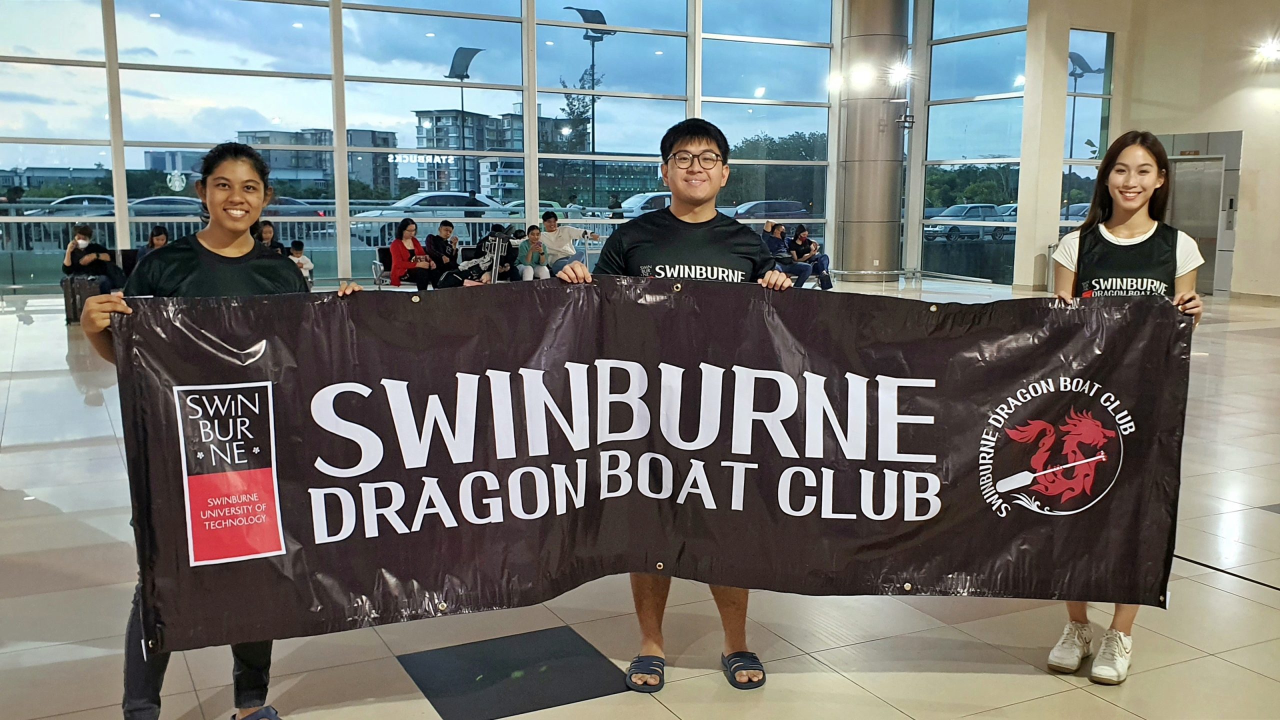 <em>(From left) Rehvathee, Marc and Pau at Kuching International Airport before flying to Sabah for the race.</em>