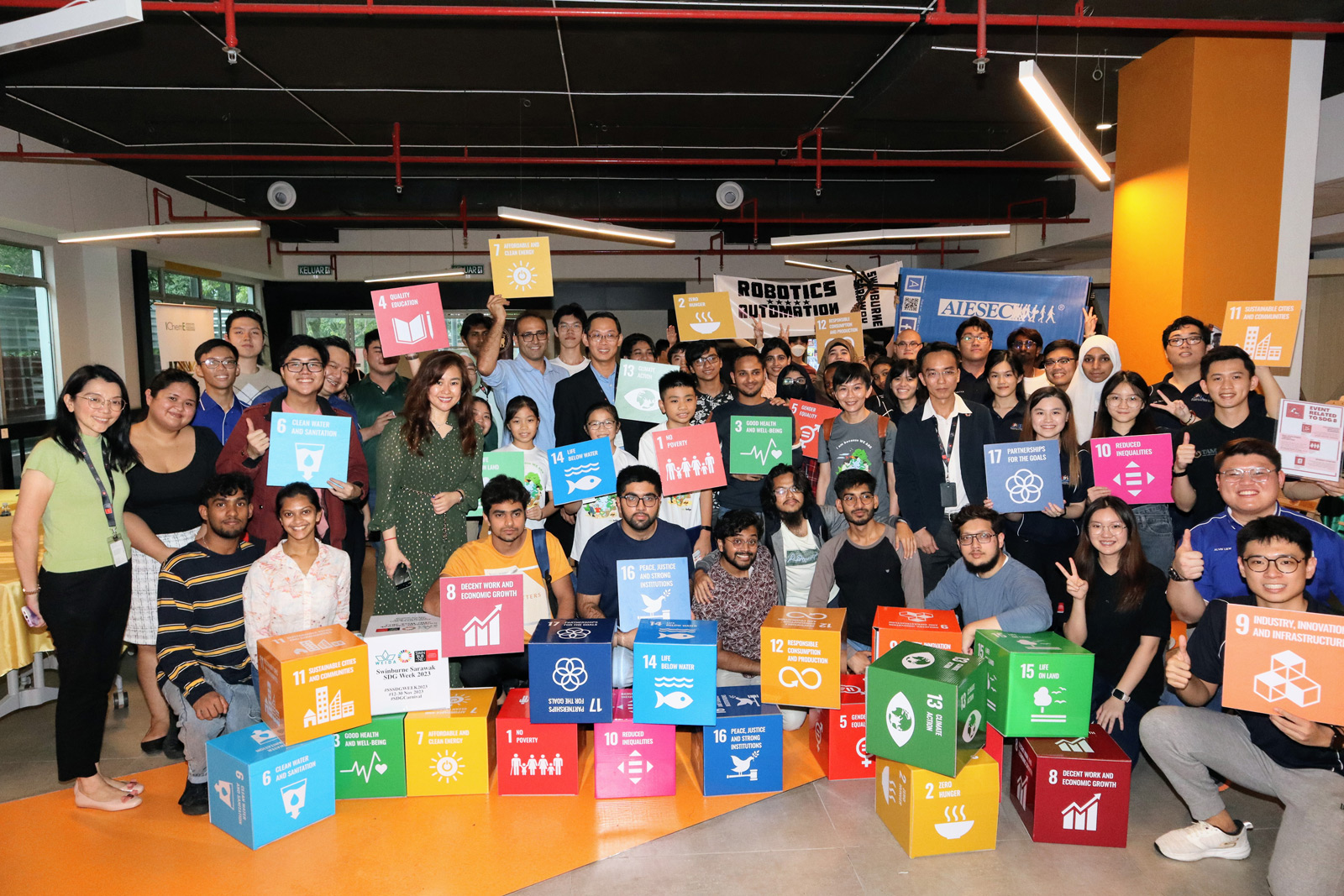 Ir Angelia Liew (first standing row, fourth left) with members of the organising committee, sponsors, guests and representatives from student-led clubs and societies.