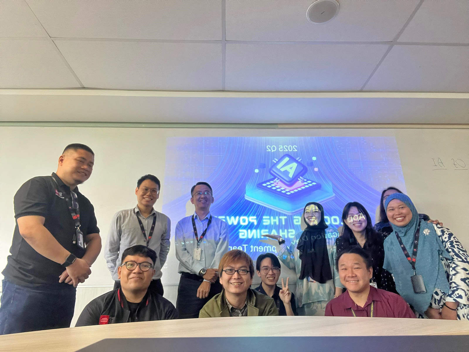 Jaden (second row, fourth from left) with his fellow IT colleagues.