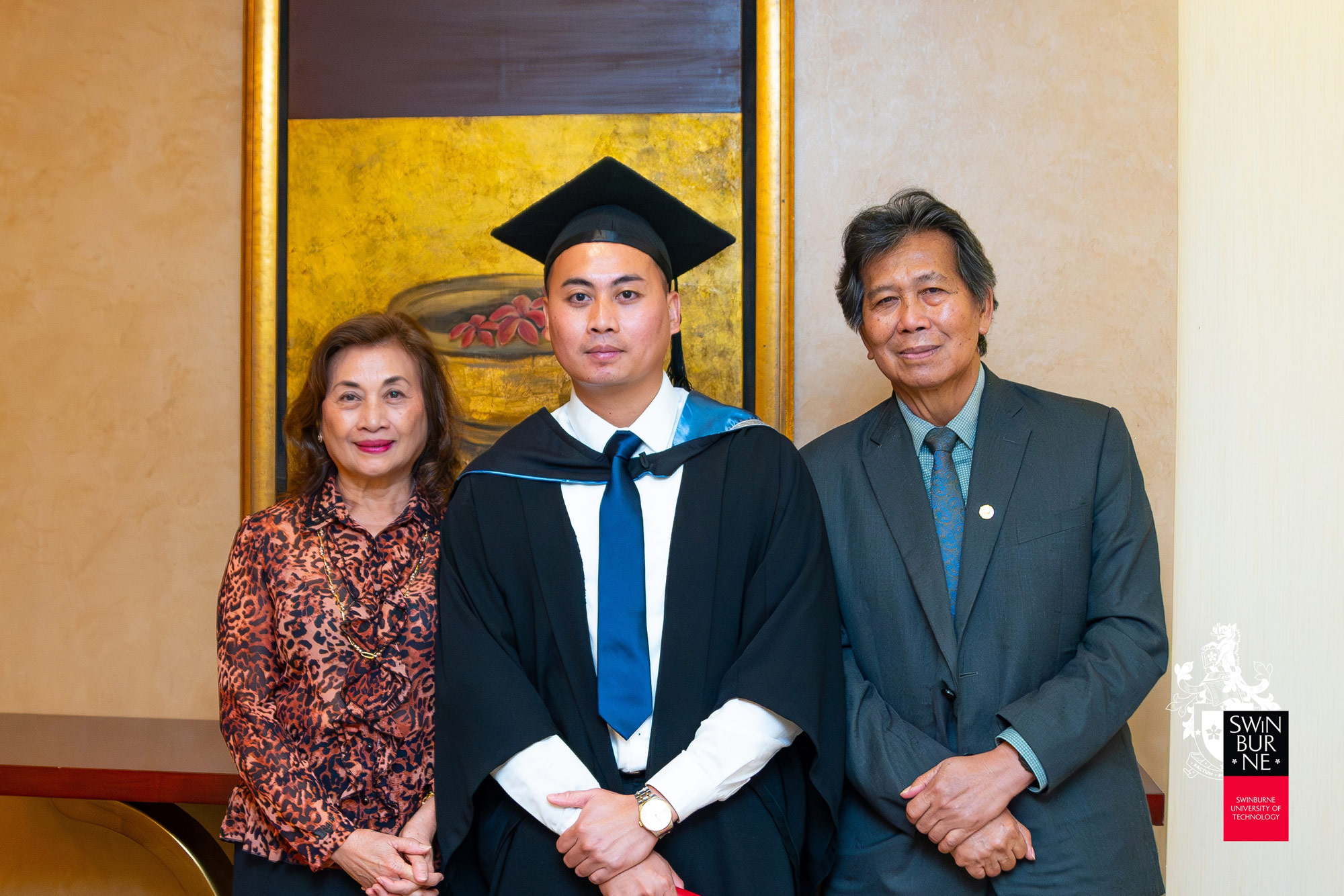 YB Datuk Dr Malcom Mussen Lamoh (right) with his wife and son, Jimson Sampar anak Usin (centre). 