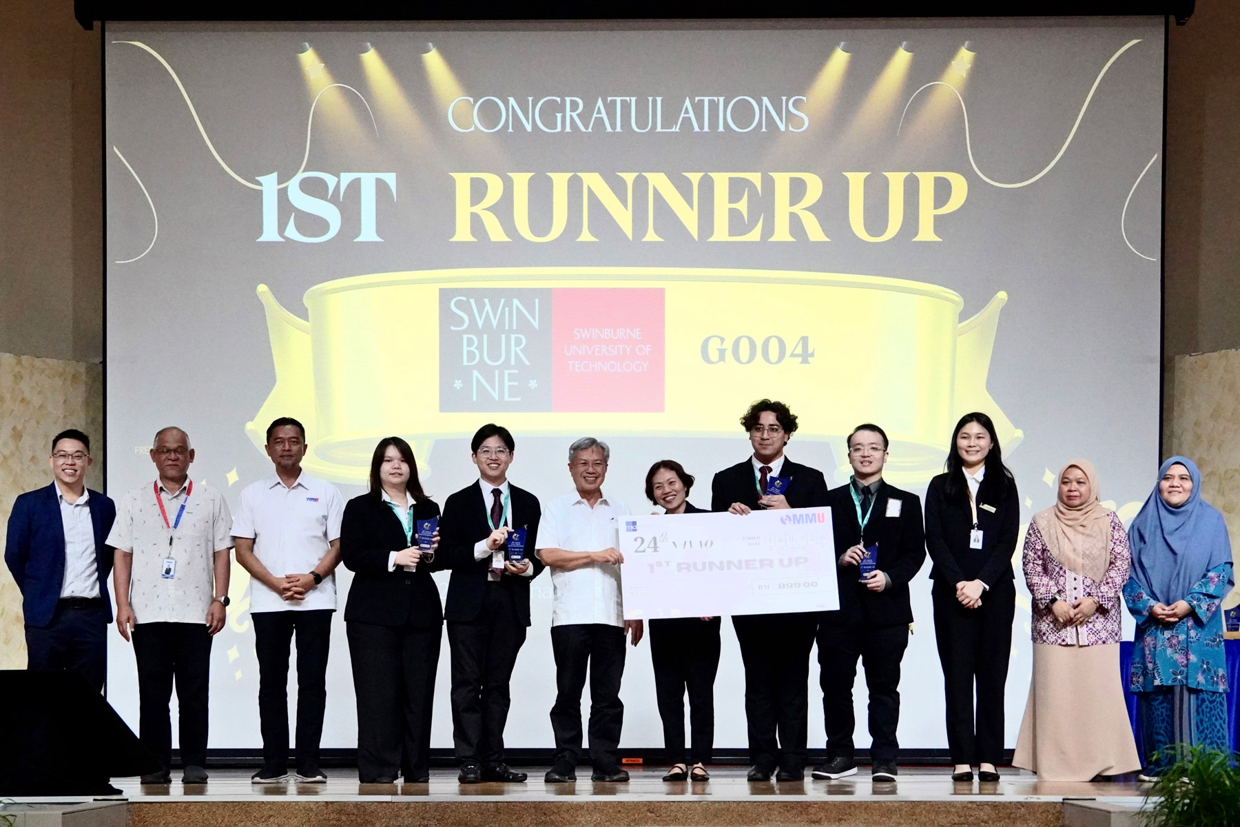 The Swinburne Sarawak team receives their award as First Runner-Up at NIVAQ 2026.