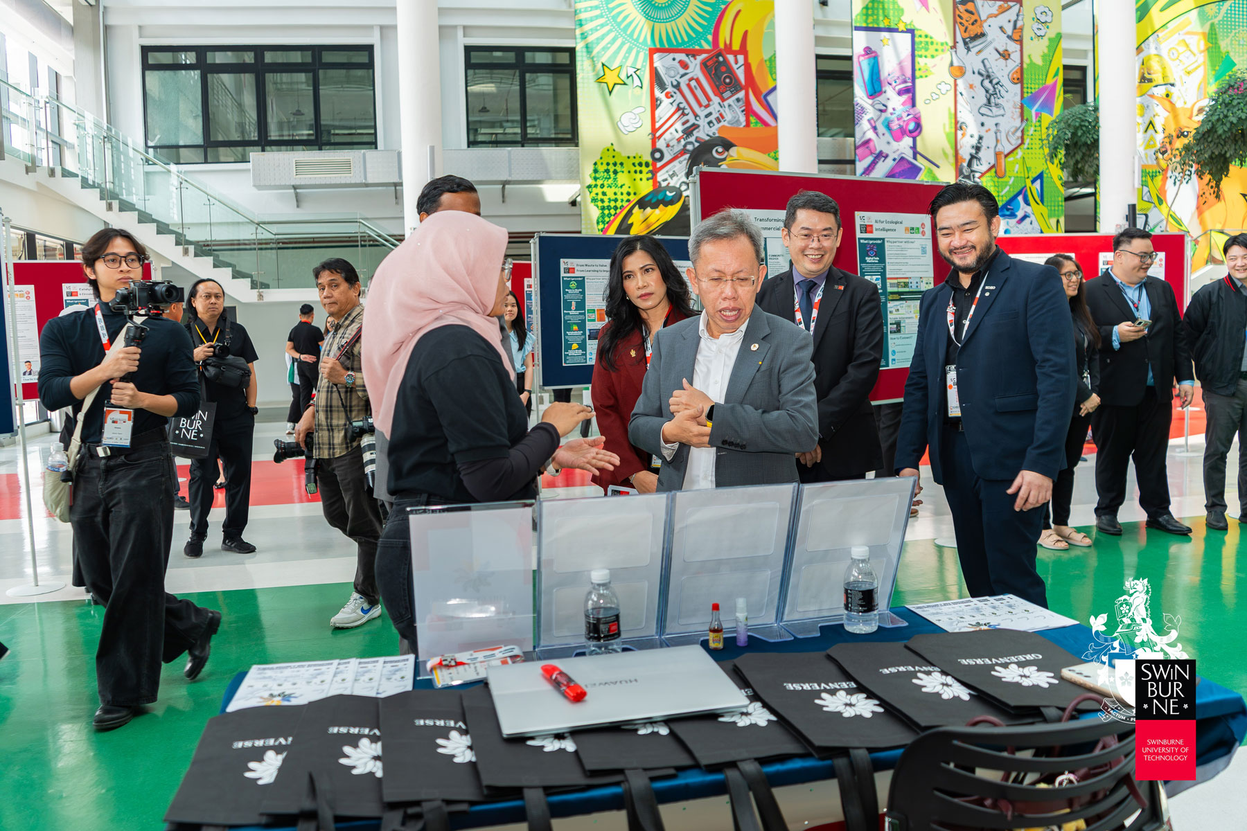Datuk Amar Professor Dr Sim Kui Hian (centre) explores the exhibition showcase at the IUC Summit 2026.