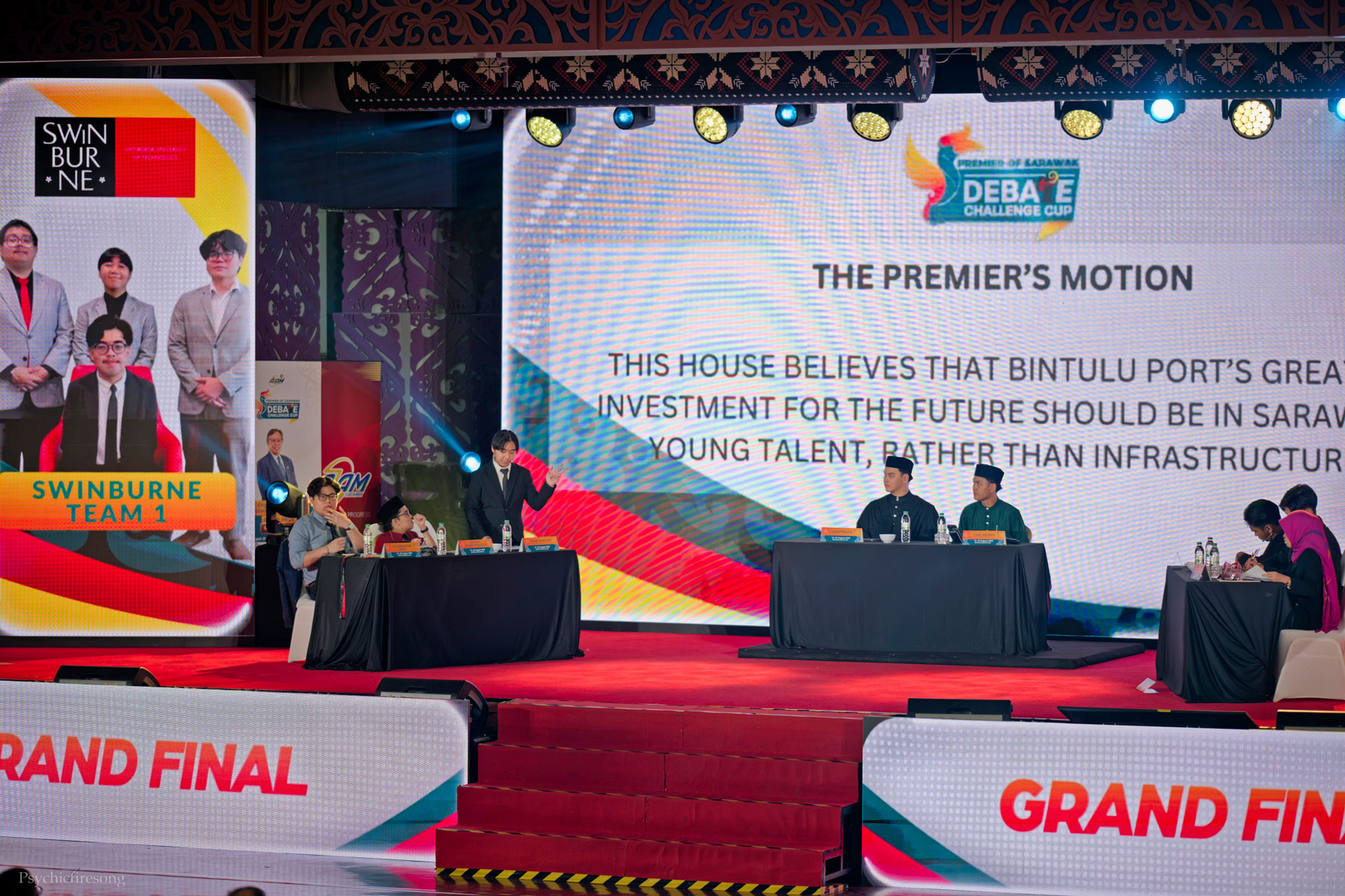 Joel (third from left) debates during the final.