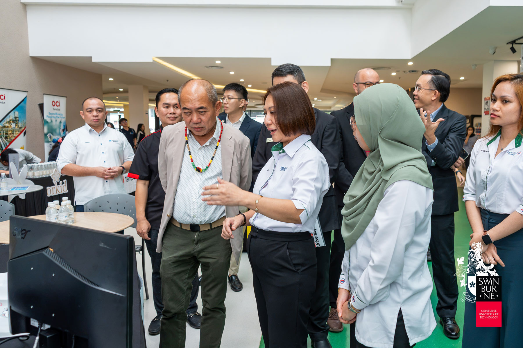 YB Datuk Gerald Rentap Jabu (front row, left) visits one of the exhibitions at the SDG Carnival 2026.
